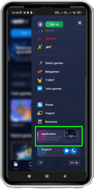 Mobile phone showing an open navigation menu with various gaming options including JetX, and others, with a highlighted section advertising an 'Application' encouraging users to install the app and get bonuses