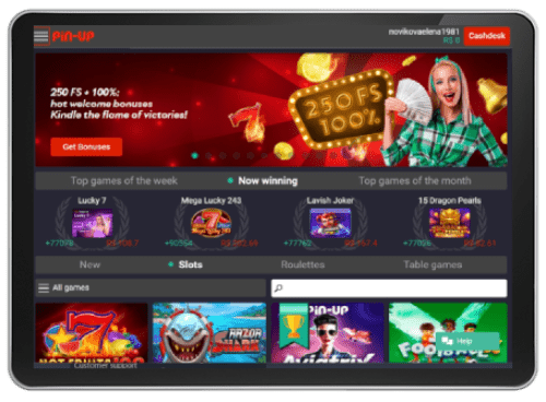 A tablet interface displaying a Pinup app home screen with a welcome bonus ad and a selection of game categories like slots, roulettes, and table games.