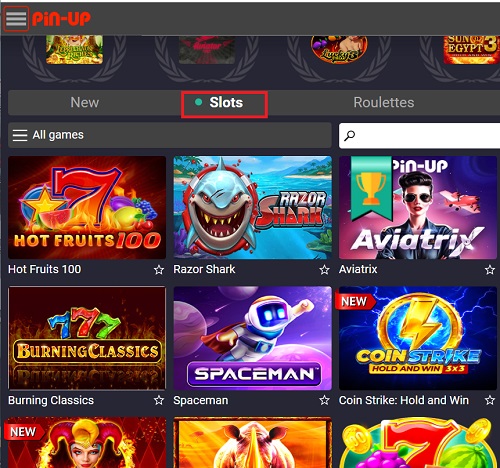 Uma interface de seção de jogos Pinup destacando a categoria 'Slots' com miniaturas coloridas de jogos.